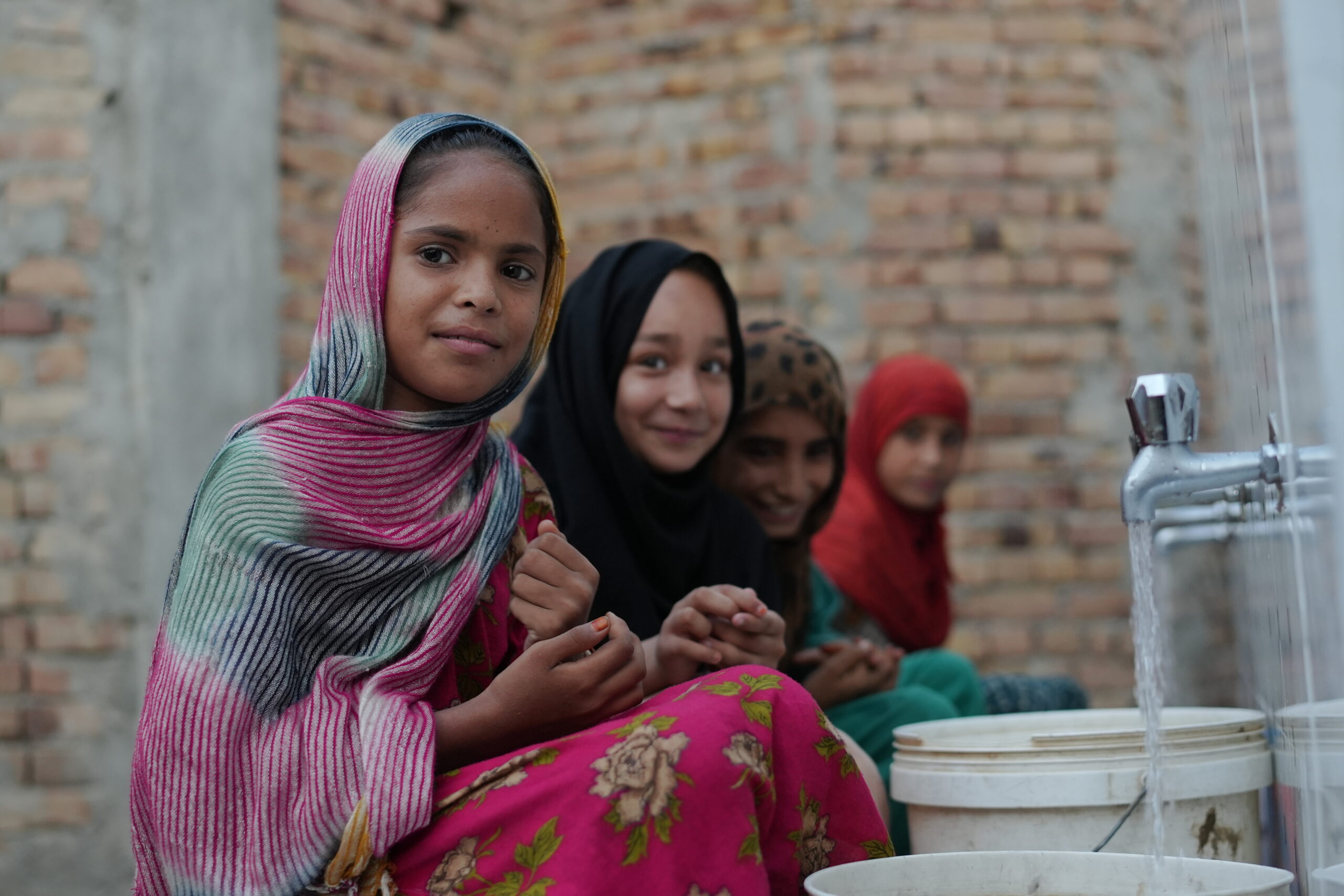 Young girls in Pakistan with Water wells